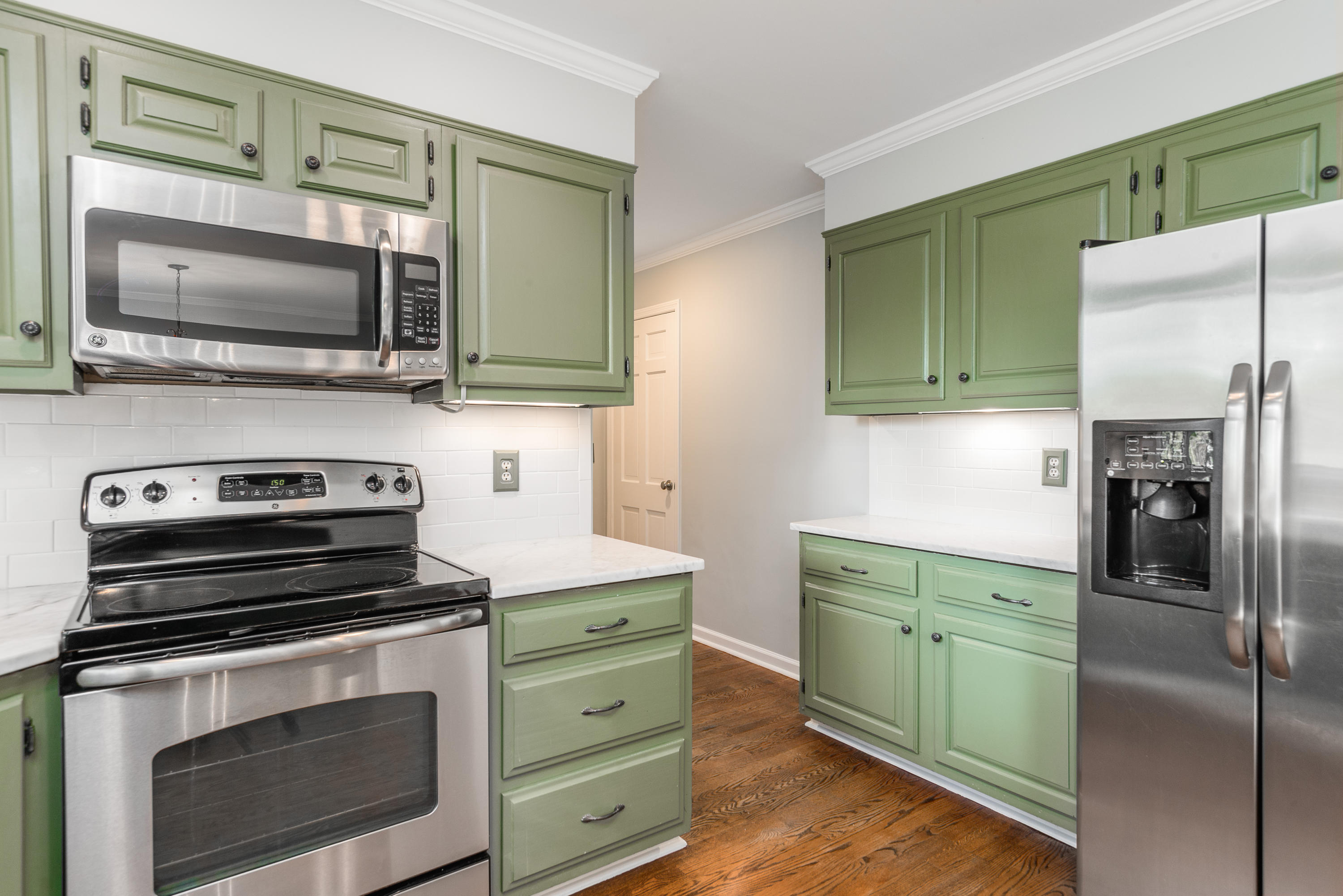 21 Barringer Road Darien, CT 06820 - Photo 17 of 34 a kitchen with a stove and a microwave