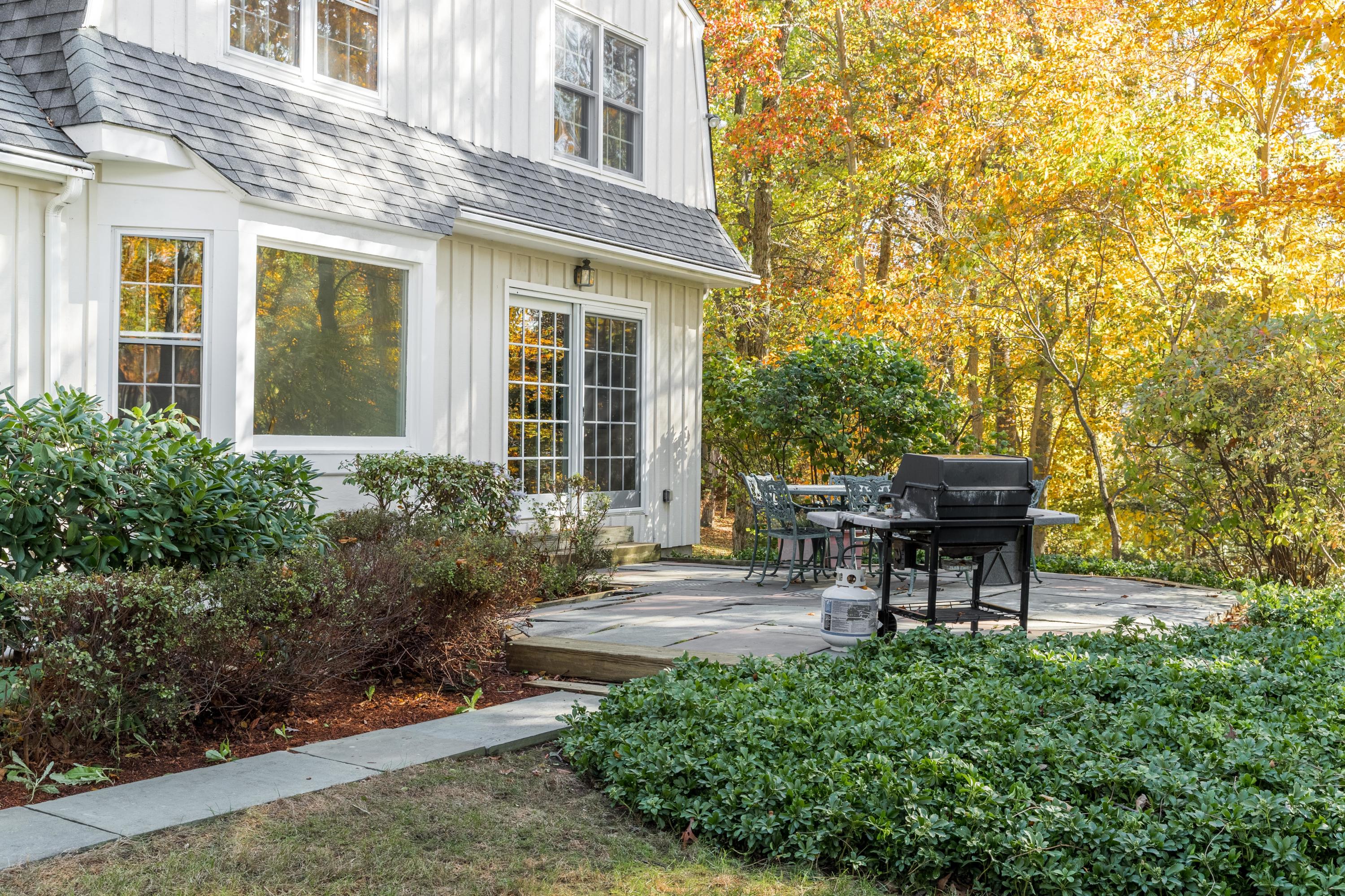 21 Barringer Road Darien, CT 06820 - Photo 30 of 34 a view of a house with backyard and sitting area