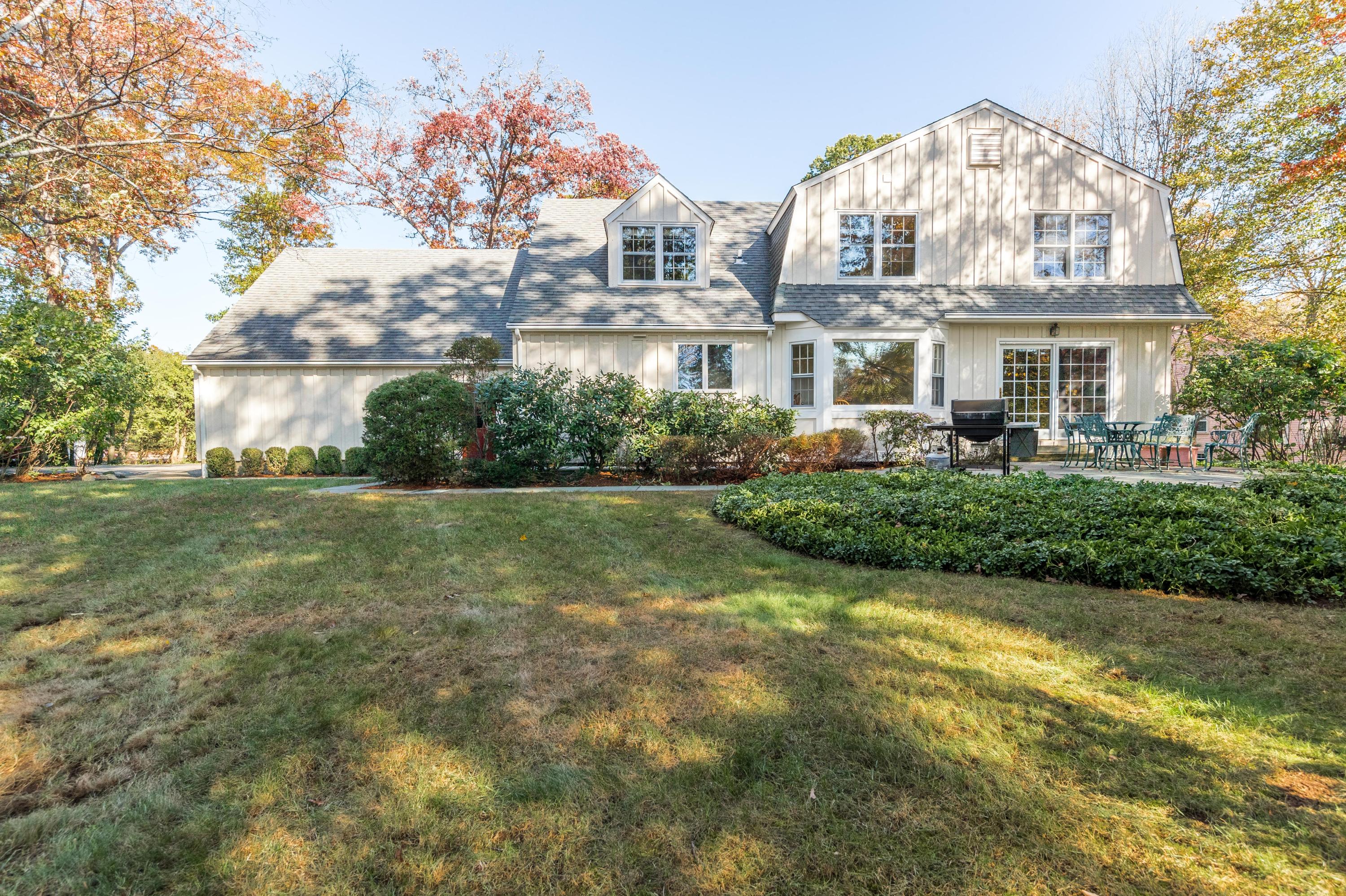 21 Barringer Road Darien, CT 06820 - Photo 32 of 34 a front view of house with yard