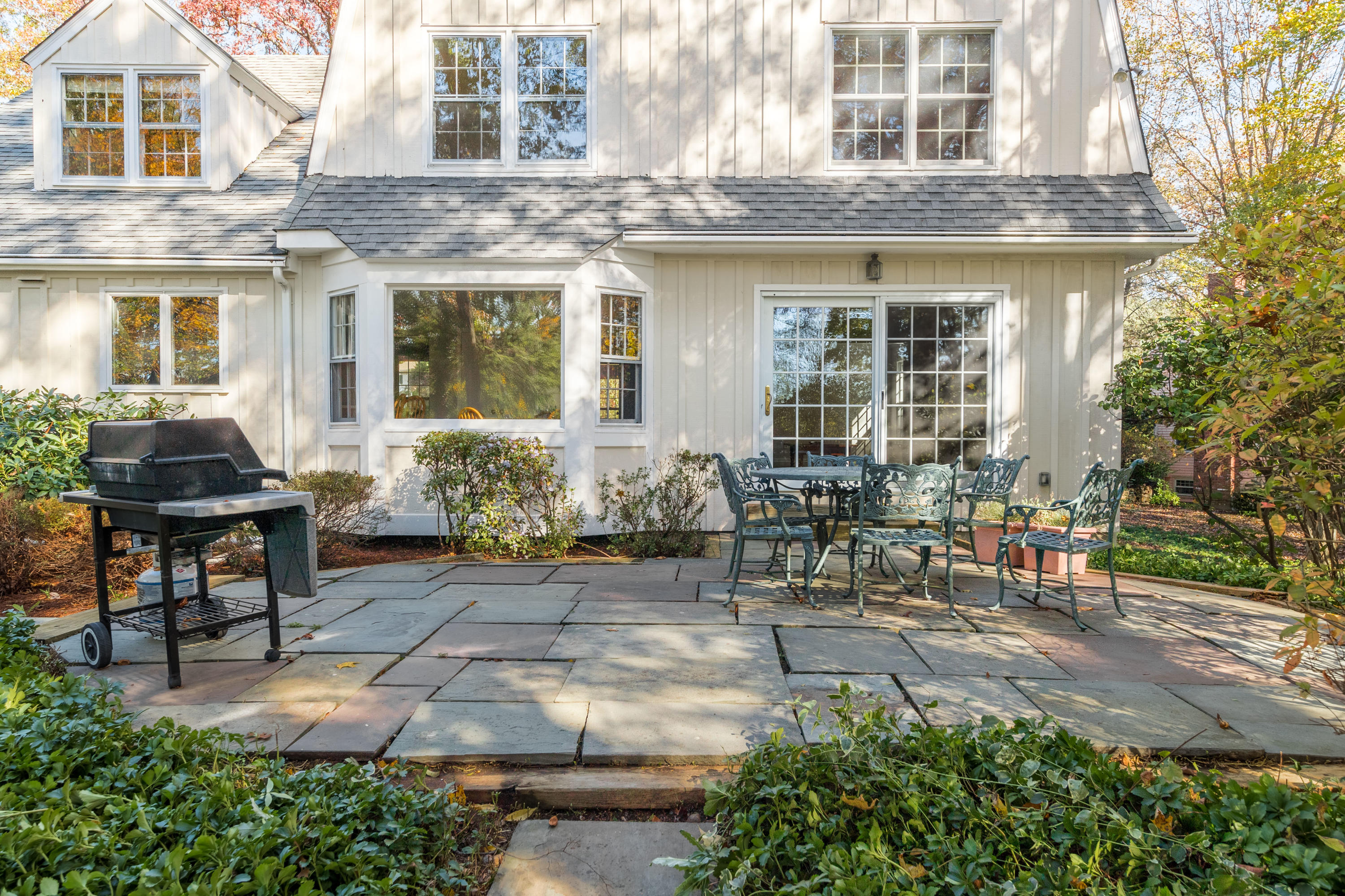 21 Barringer Road Darien, CT 06820 - Photo 33 of 34 a front view of a house with outdoor seating