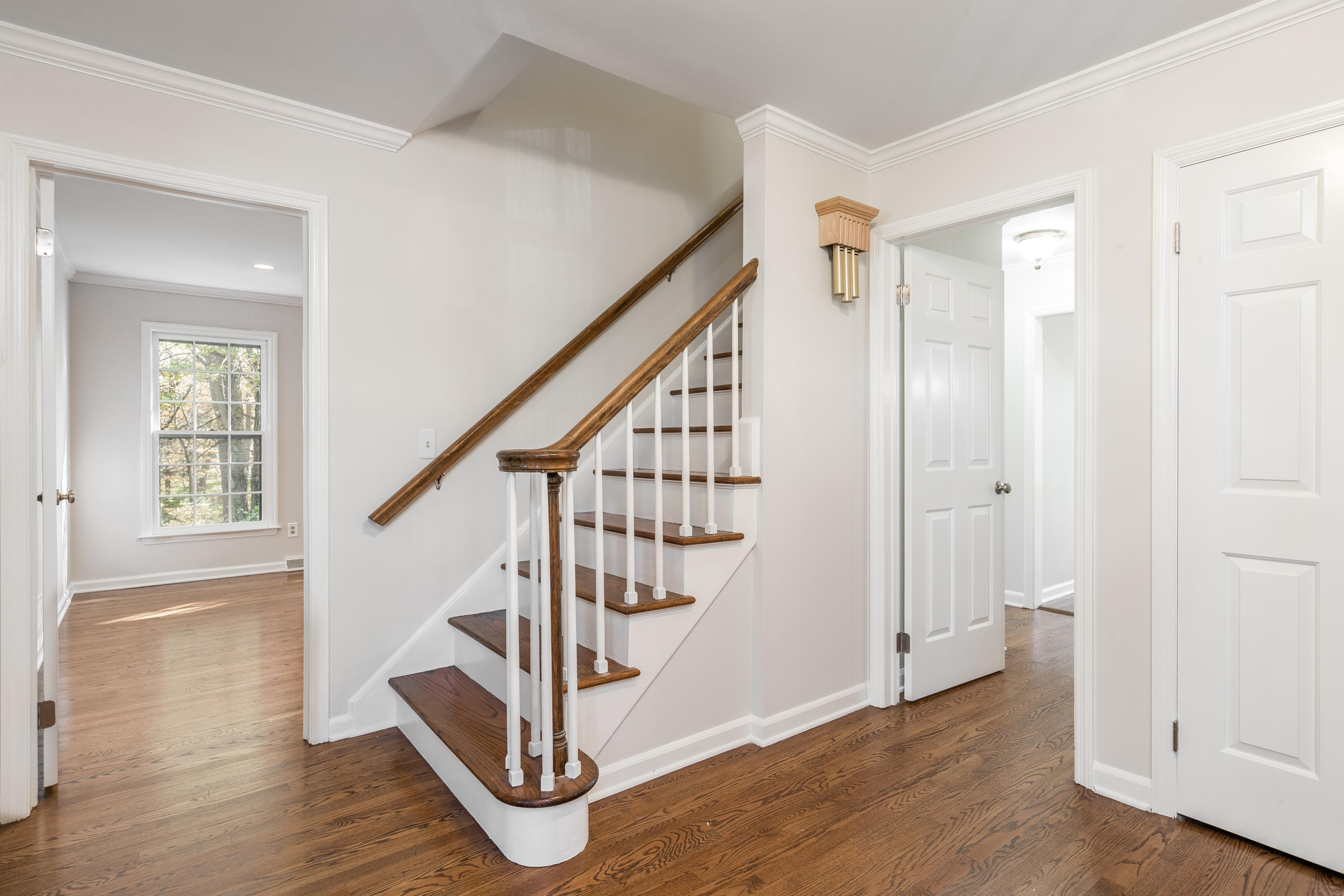 21 Barringer Road Darien, CT 06820 - Photo 4 of 34 a view of entryway with wooden floor and stairs