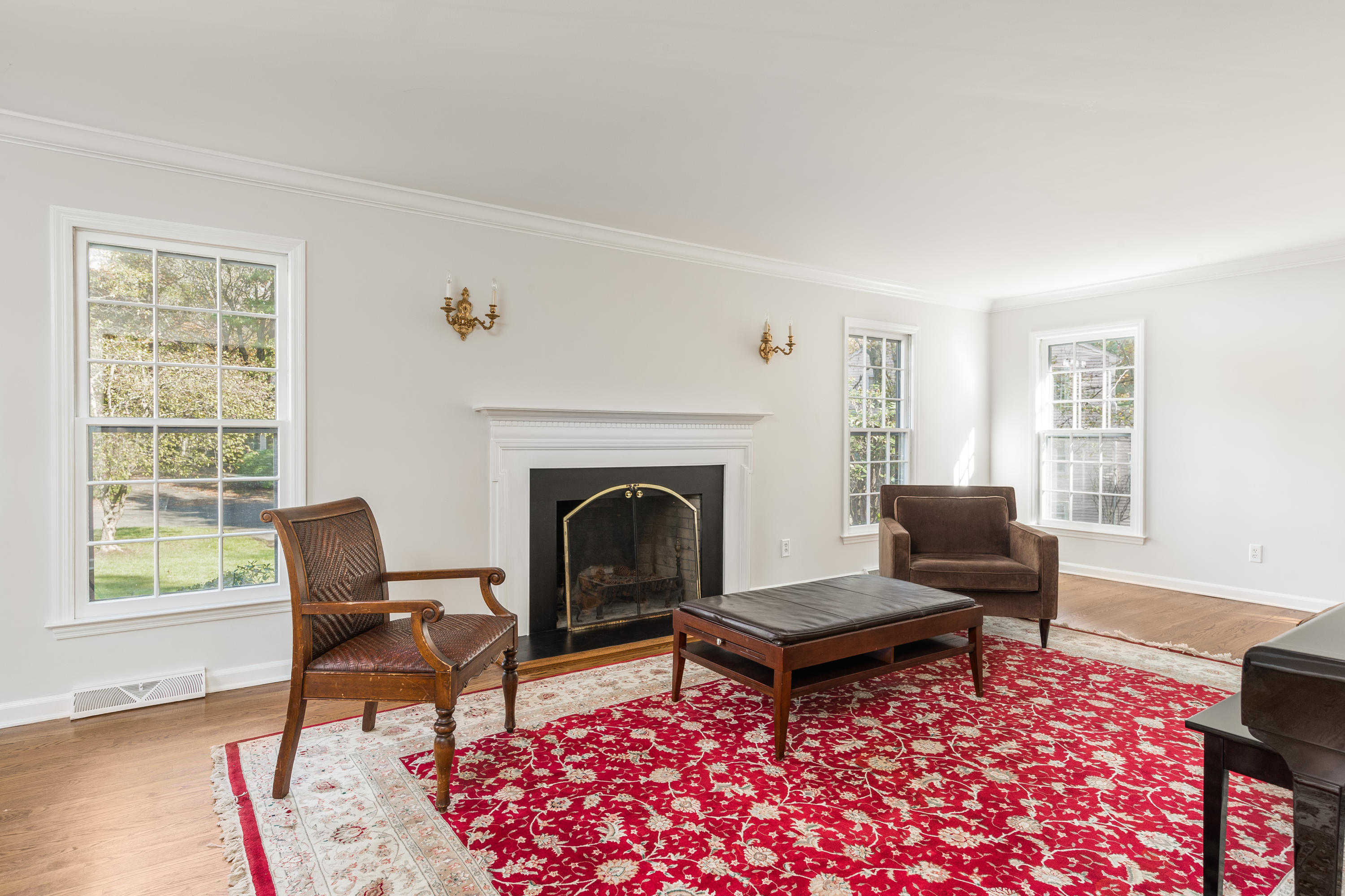 21 Barringer Road Darien, CT 06820 - Photo 5 of 34 a living room with furniture a rug and a window