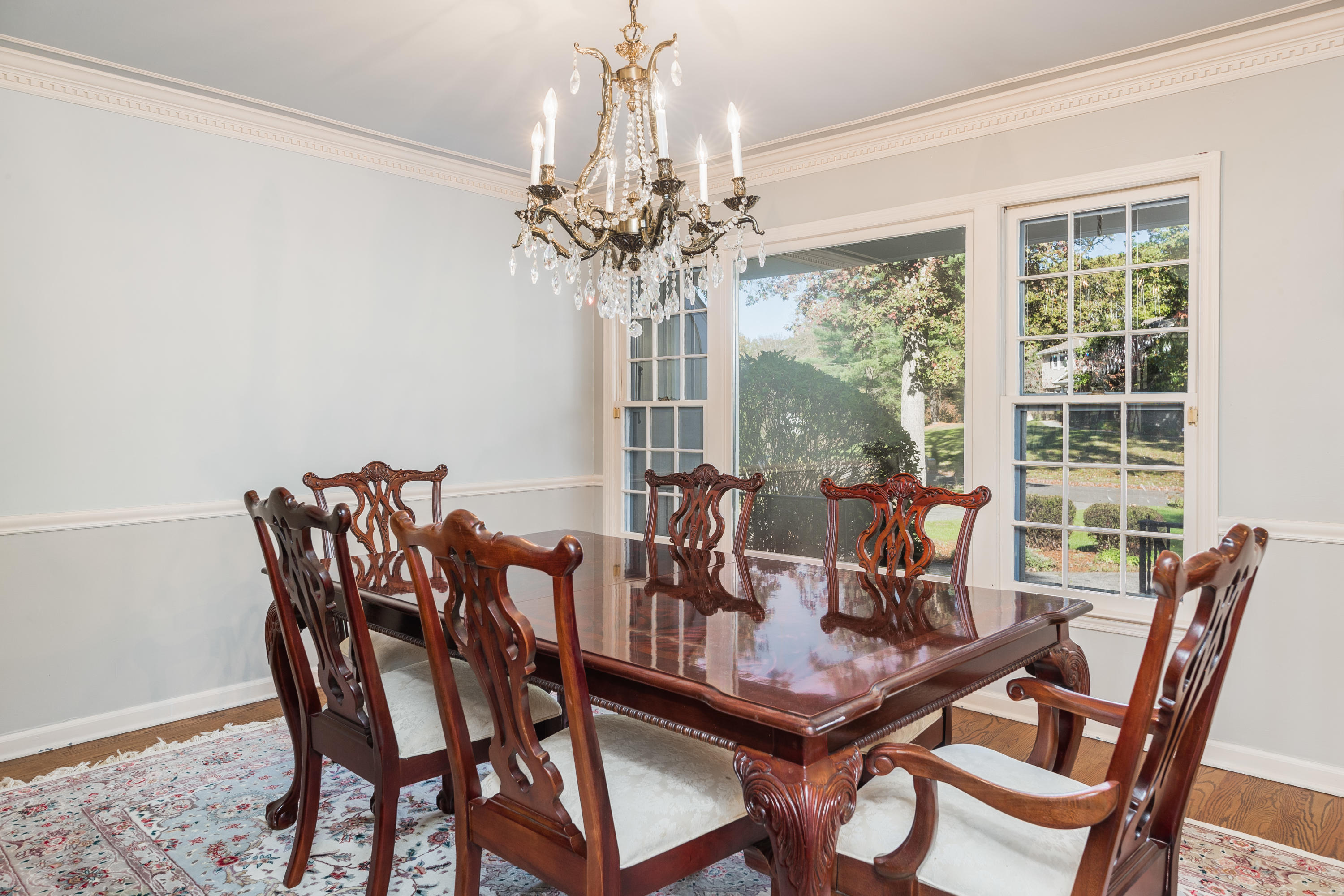 21 Barringer Road Darien, CT 06820 - Photo 7 of 34 a view of a dining room with furniture window and outside view