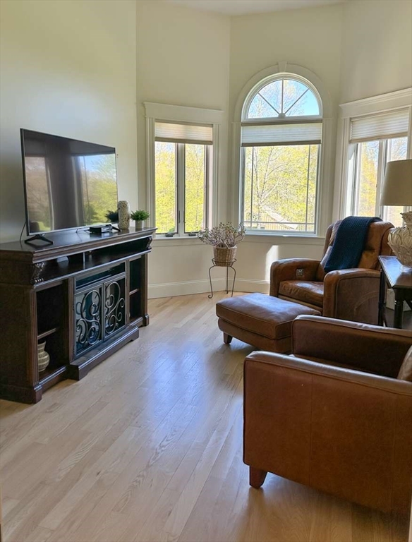 37 Putnam Hill Road Sutton, MA 01590 - Photo 19 of 42 a living room with furniture and a flat screen tv