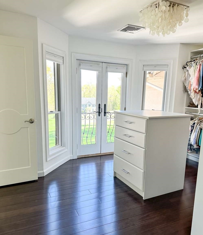 37 Putnam Hill Road Sutton, MA 01590 - Photo 28 of 42 an empty room with wooden floor cabinet and windows