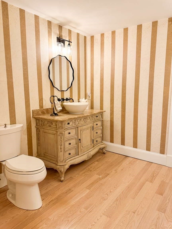 37 Putnam Hill Road Sutton, MA 01590 - Photo 33 of 42 a bathroom with a granite countertop toilet a sink and a mirror