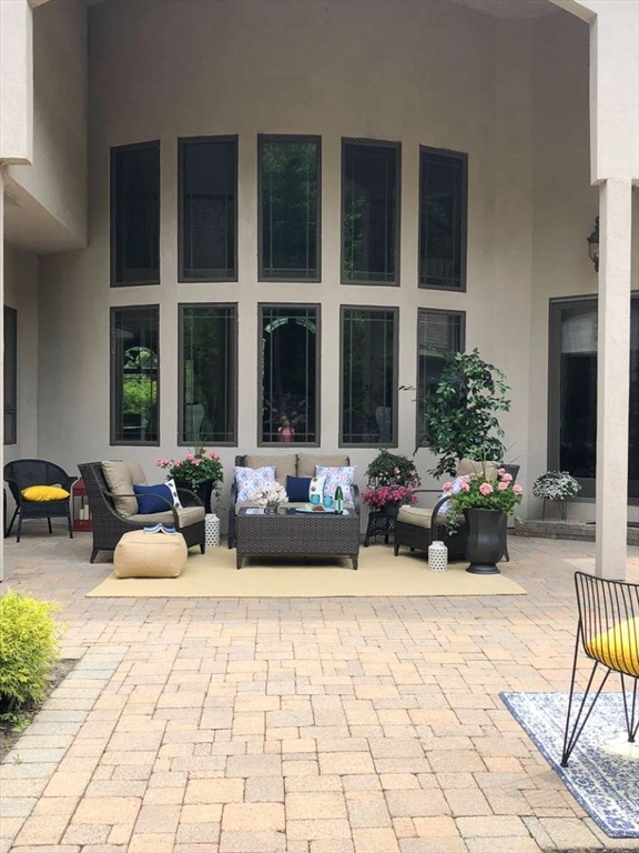 37 Putnam Hill Road Sutton, MA 01590 - Photo 6 of 42 a view of a lobby with a bench and a potted plant