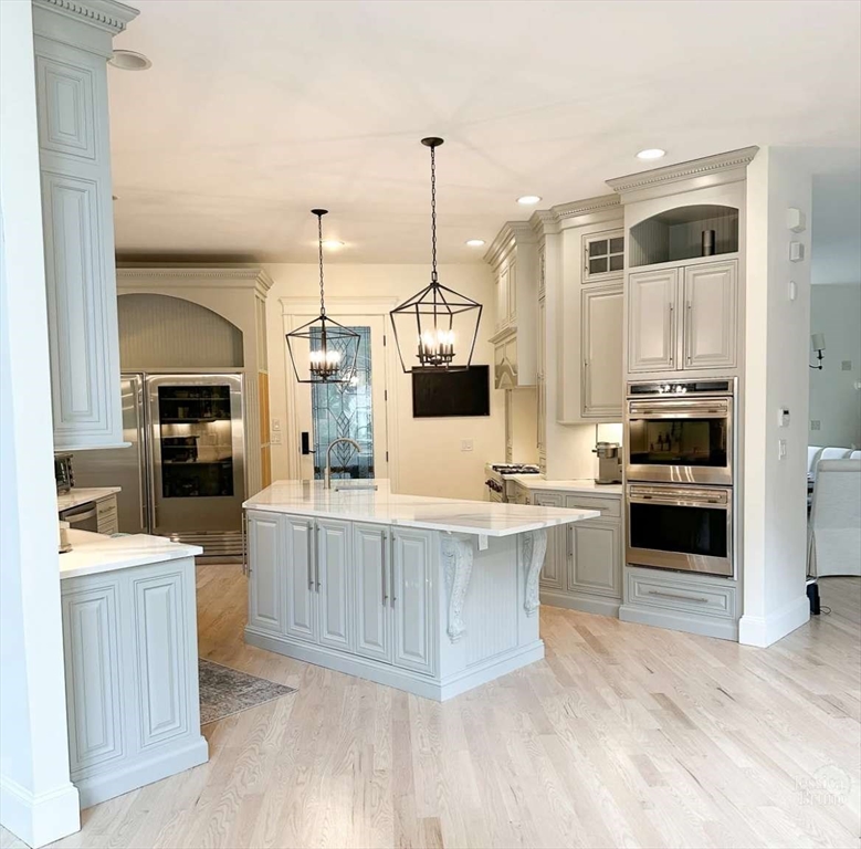 37 Putnam Hill Road Sutton, MA 01590 - Photo 7 of 42 a kitchen with stainless steel appliances a stove top oven and cabinets