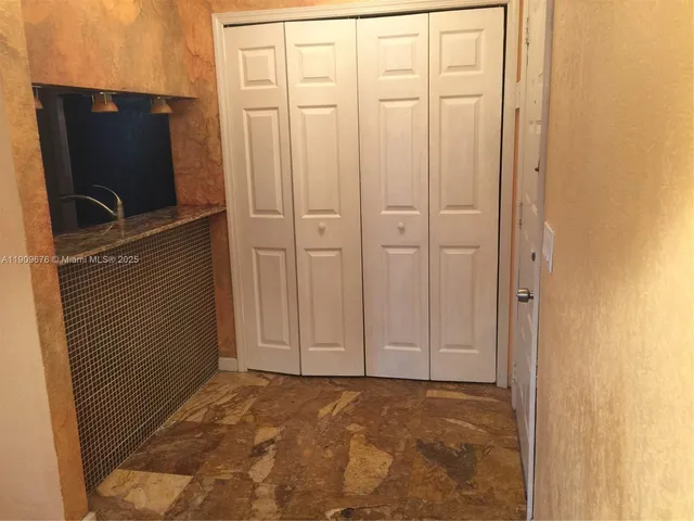 a view of a livingroom with storage area