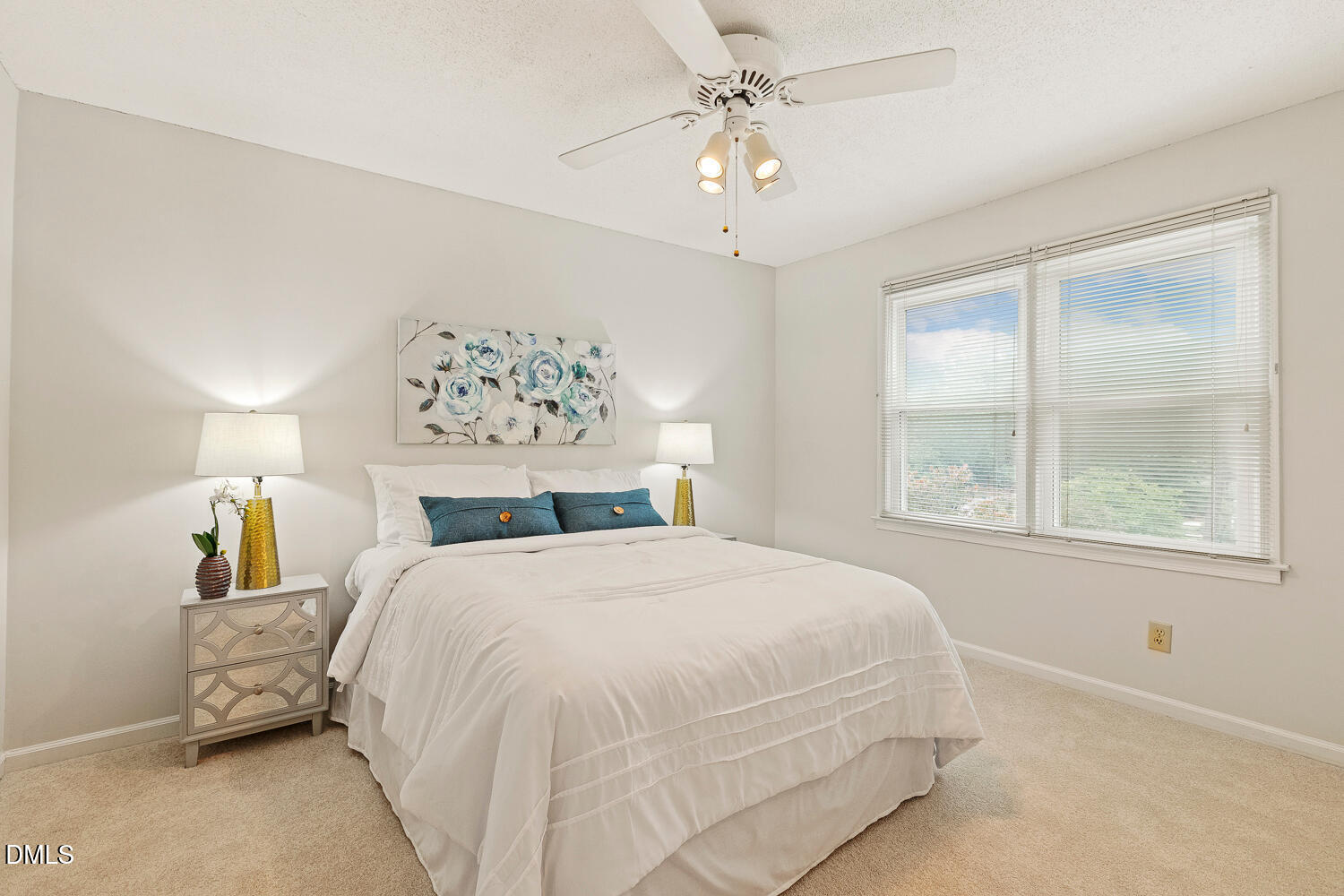 5401 Kaplan Drive Raleigh, NC 27606 - Photo 15 of 41 a bedroom with a large bed and a window