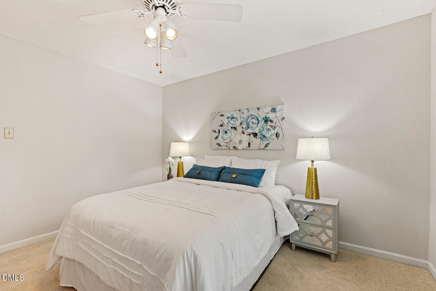 5401 Kaplan Drive Raleigh, NC 27606 - Photo 16 of 41 a bedroom with a bed and a chandelier