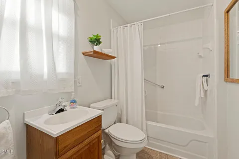 a bathroom with a sink a vanity and a mirror