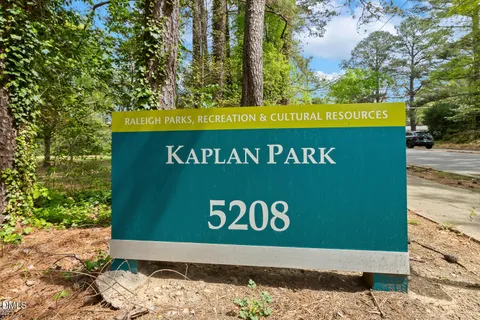 a view of backyard with green space