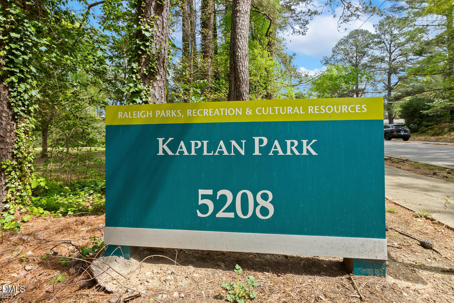 5401 Kaplan Drive Raleigh, NC 27606 - Photo 39 of 41 a sign on the side of the road