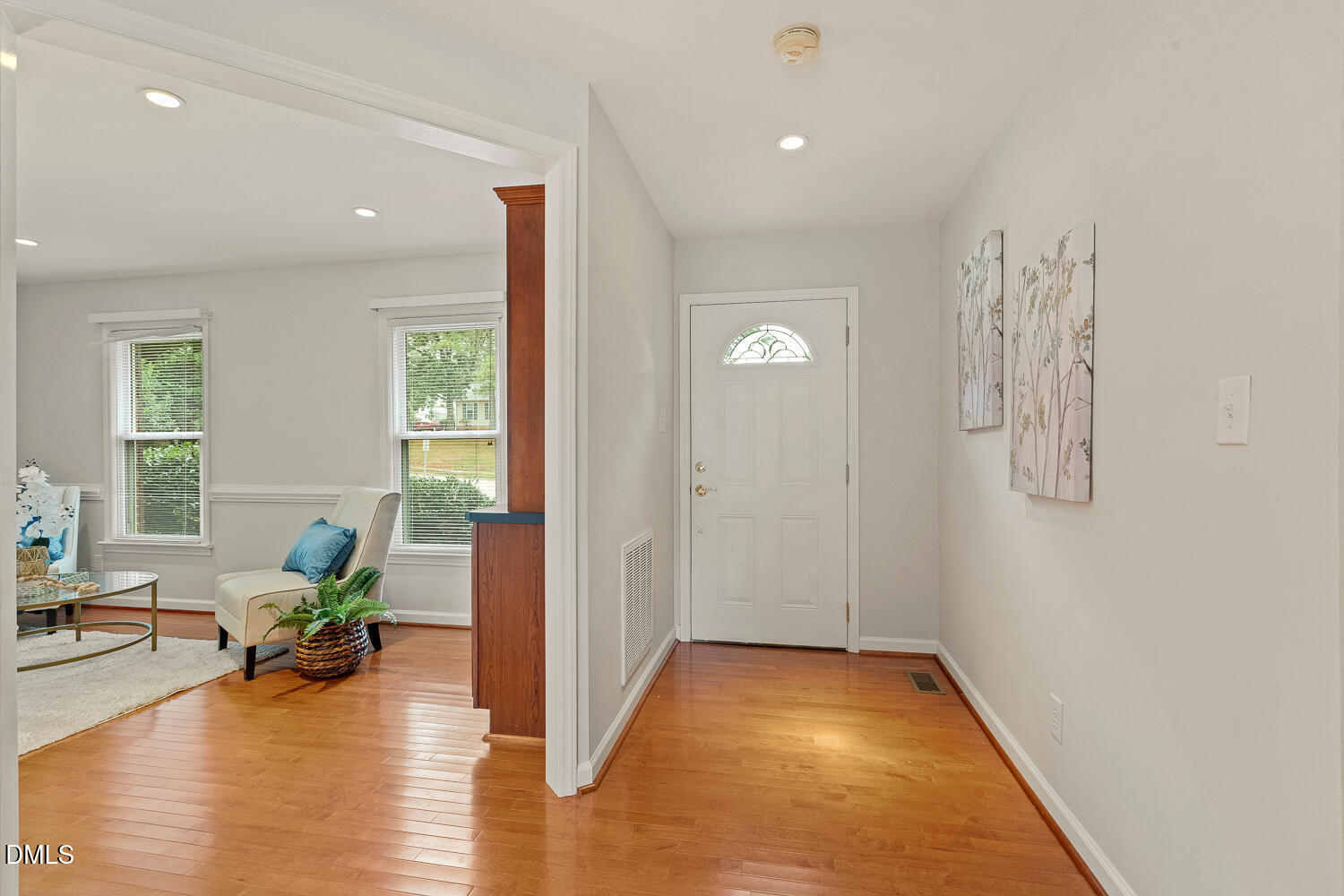 5401 Kaplan Drive Raleigh, NC 27606 - Photo 5 of 41 a living room with furniture and a wooden floor