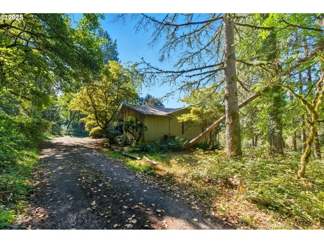 a view of a yard from a balcony
