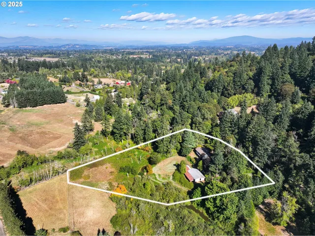 a view of a lake with a yard