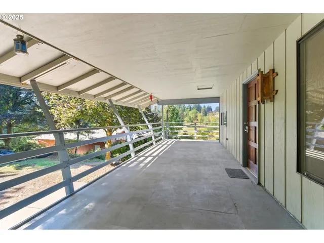 a view of balcony with two chairs