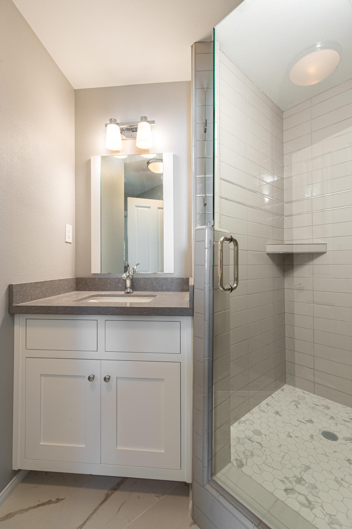 705 Mesa Drive Solvang, CA 93463 - Photo 14 of 22 a bathroom with a sink and mirror