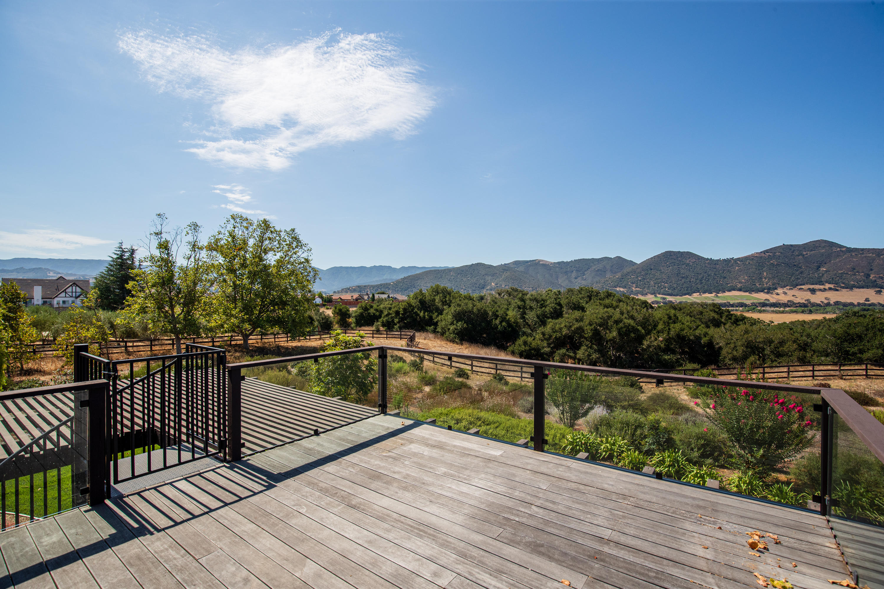 705 Mesa Drive Solvang, CA 93463 - Photo 4 of 22 a view of a balcony with wooden floor and lake view