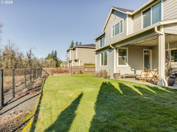 a backyard of a house with seating space
