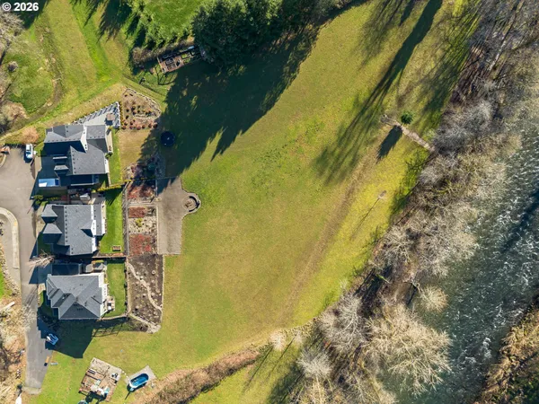 a view of a swimming pool with an outdoor space and seating area