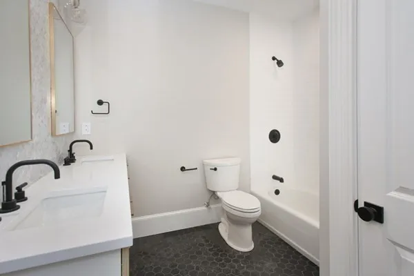a bathroom with a sink and a toilet