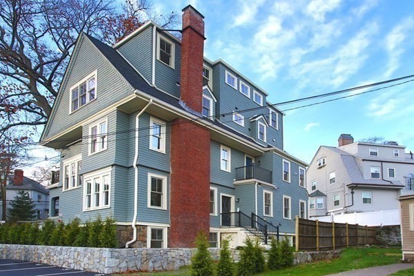 15 Lanark Road, Unit G Brookline, MA 02445 - Photo 24 of 30 a front view of a residential apartment building with a yard