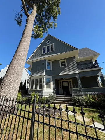 a front view of a house with balcony