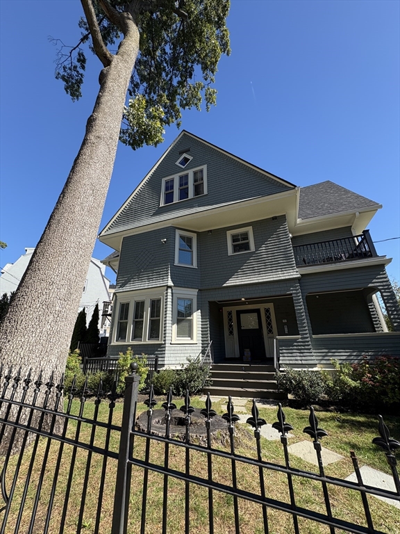 15 Lanark Road, Unit G Brookline, MA 02445 - Photo 29 of 30 a front view of a house with balcony