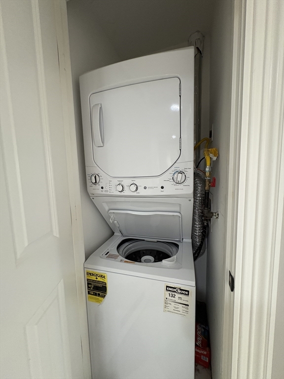 15 Lanark Road, Unit G Brookline, MA 02445 - Photo 7 of 30 a utility room with dryer and washer