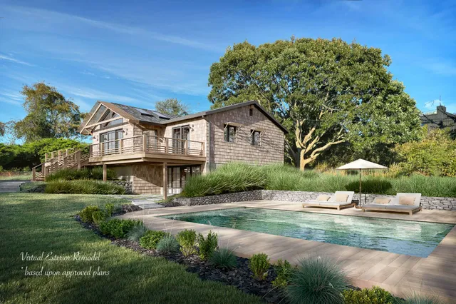 a front view of a house with garden