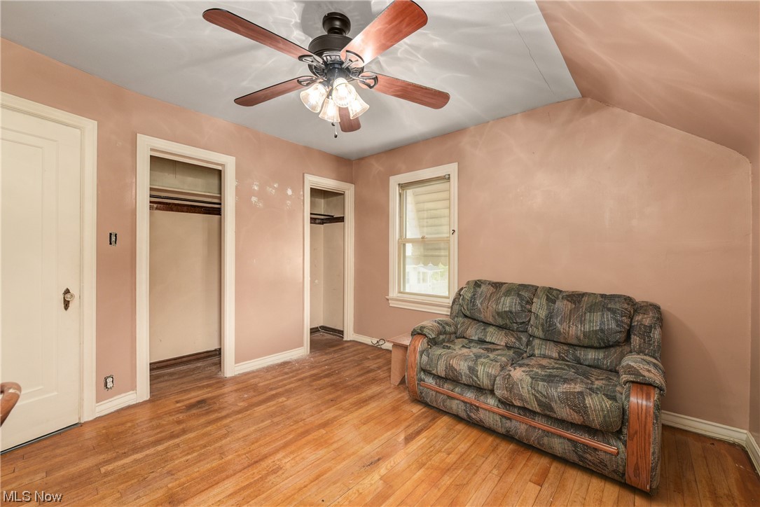 4709 Snow Road Cleveland, OH 44134 - Photo 21 of 35 3rd Bedroom featuring ceiling fan, vaulted ceiling, and hardwood floors