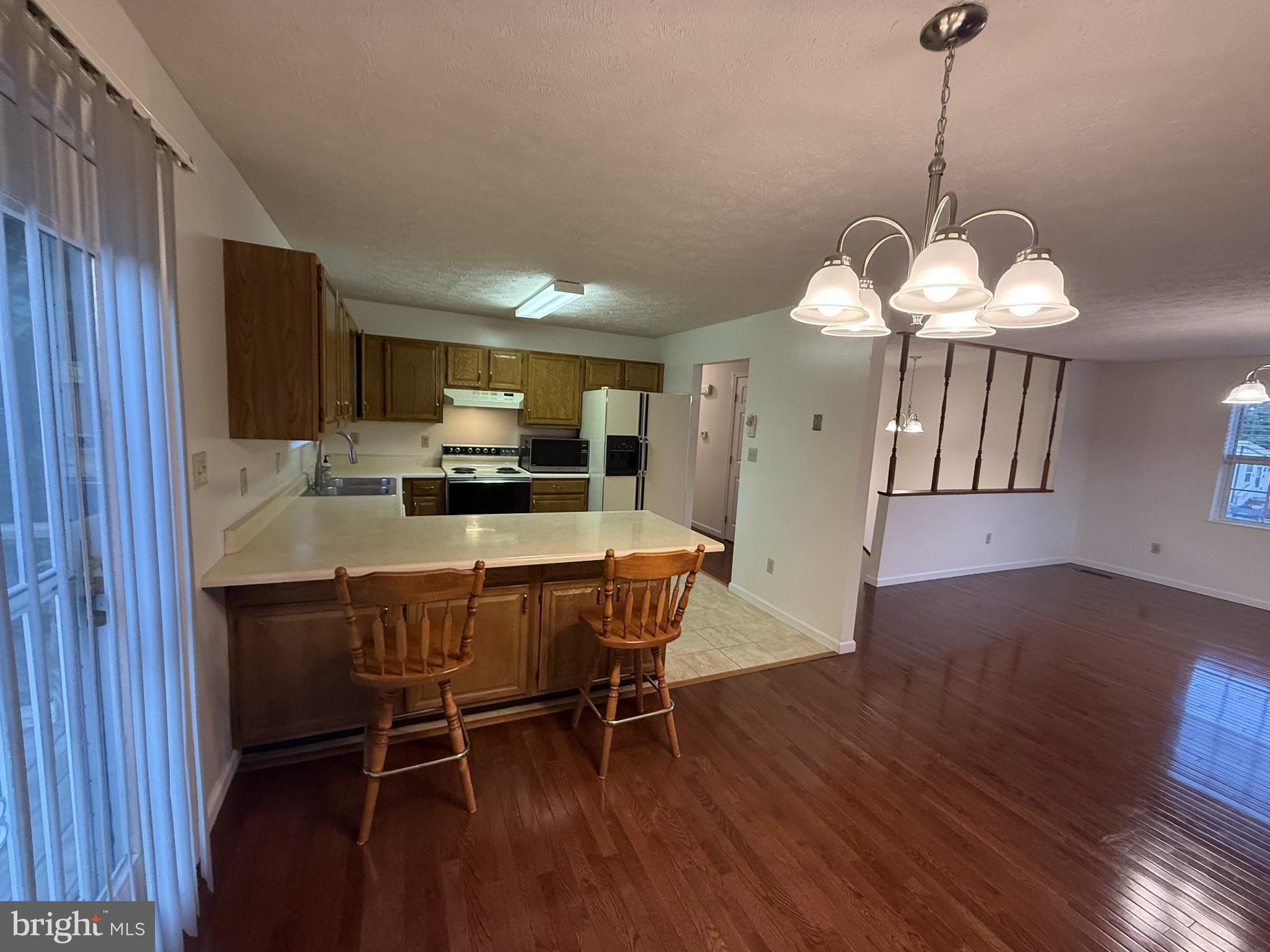 21 Coolidge Road Inwood, WV 25428 - Photo 30 of 80 Open-Concept Living, Dining & Kitchen Area