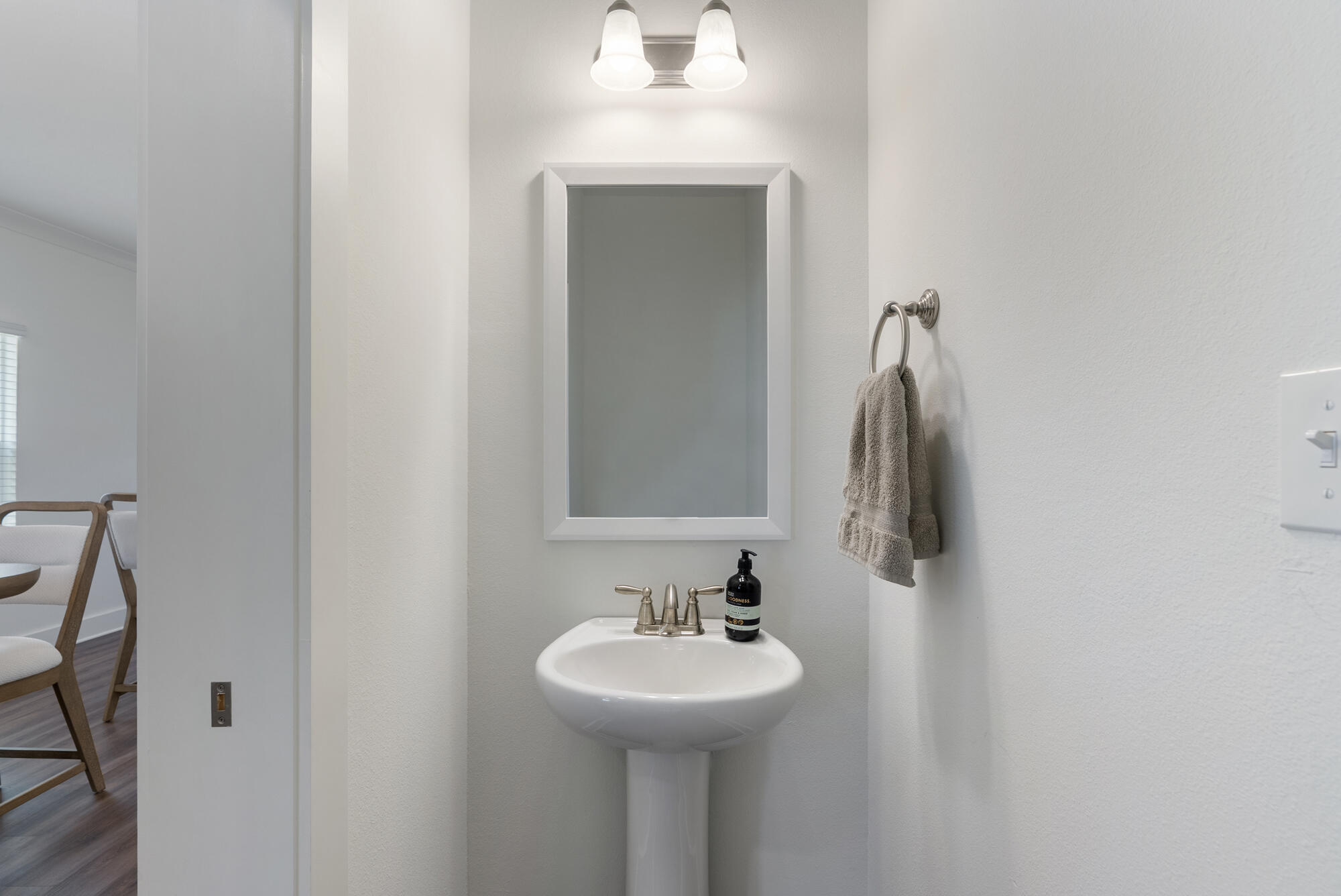 36 Date Palm Lane Freeport, FL 32439 - Photo 11 of 26 a bathroom with a sink and a mirror