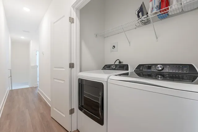 a utility room with dryer and washer