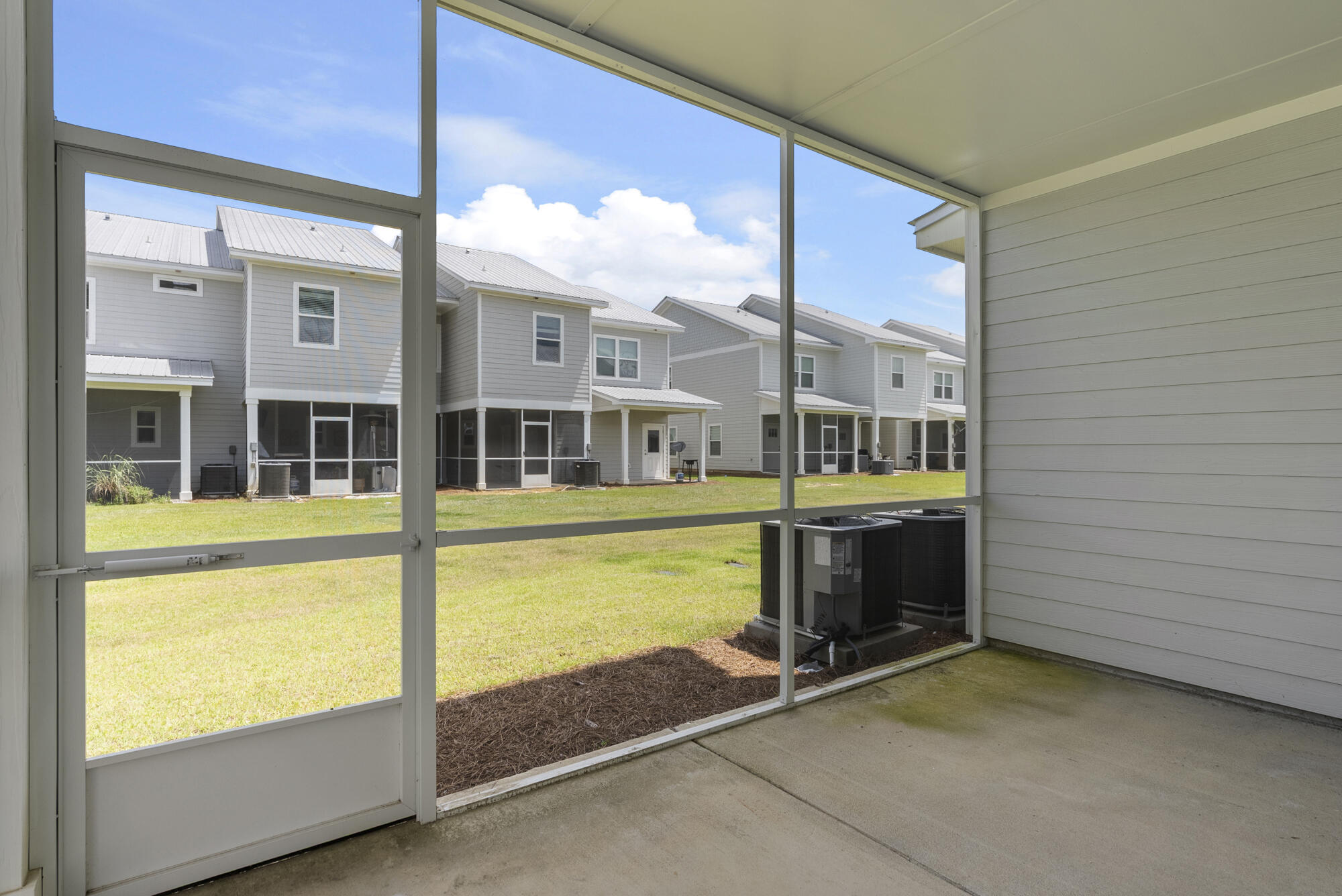 36 Date Palm Lane Freeport, FL 32439 - Photo 22 of 26 a view of a building with a balcony