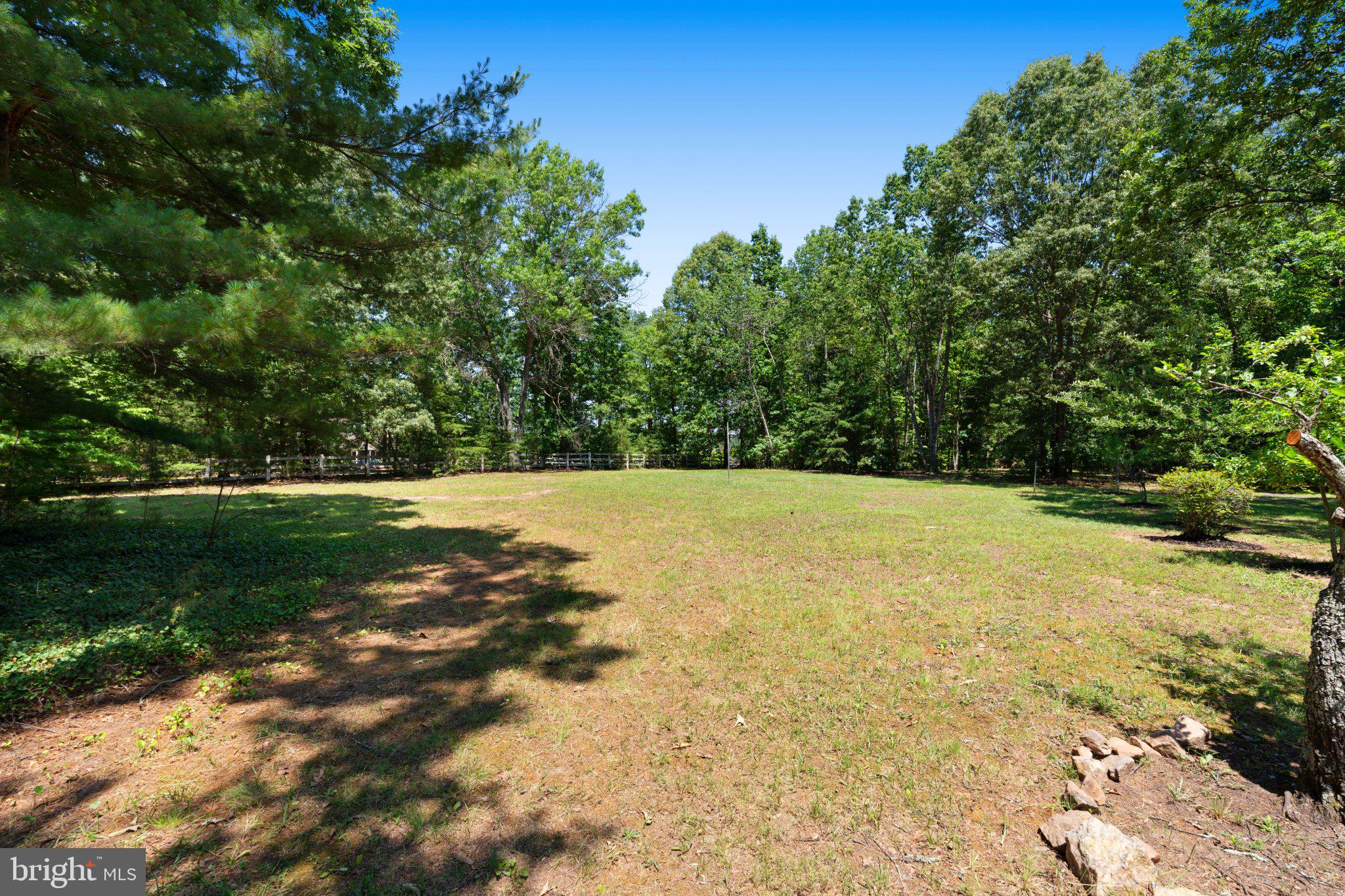 8405 Shirley Road Spotsylvania, VA 22551 - Photo 39 of 42 a view of a field with grass and trees