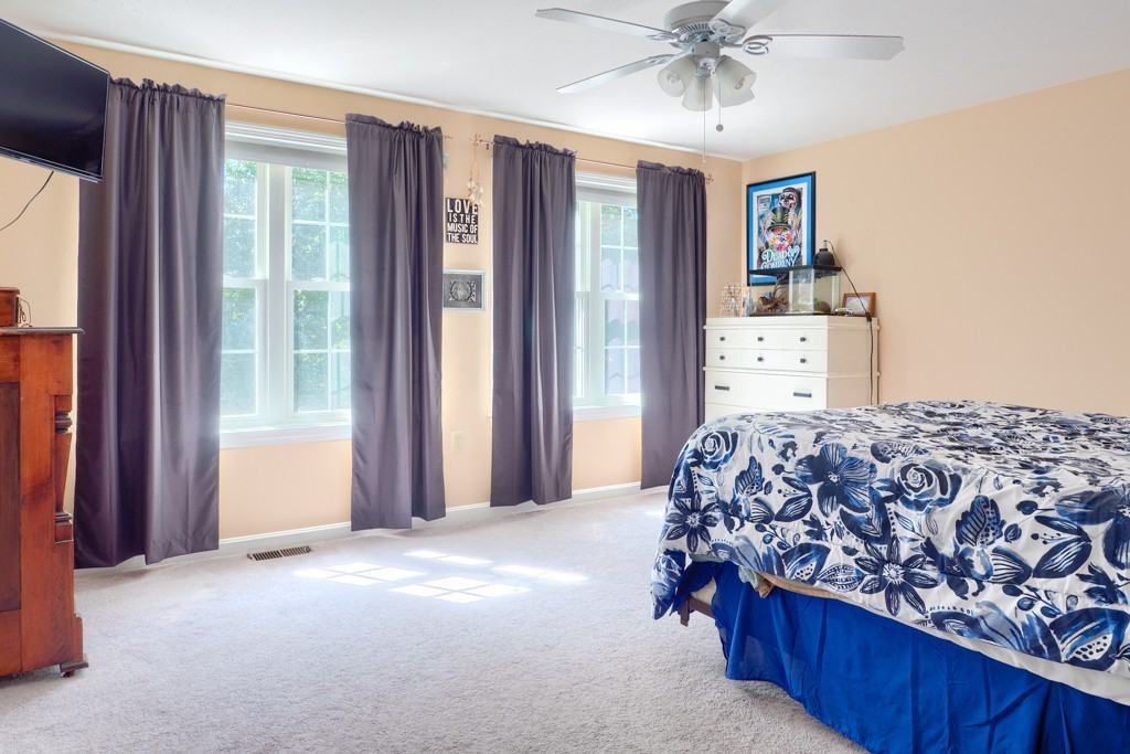 125 Shire Road, Unit 40 Leominster, MA 01453 - Photo 18 of 29 a bedroom with a bed and a window