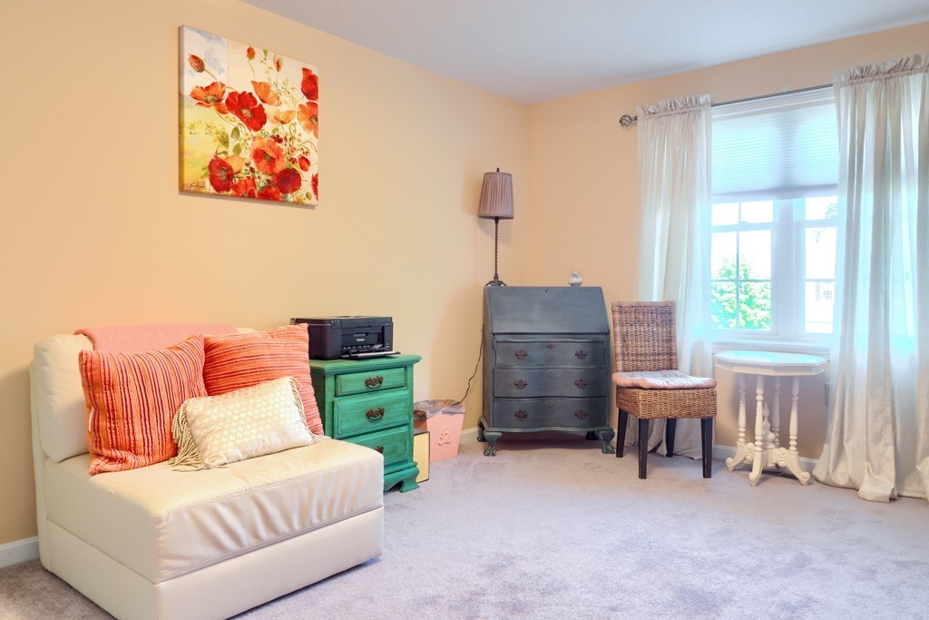 125 Shire Road, Unit 40 Leominster, MA 01453 - Photo 20 of 29 a bedroom with furniture and a window