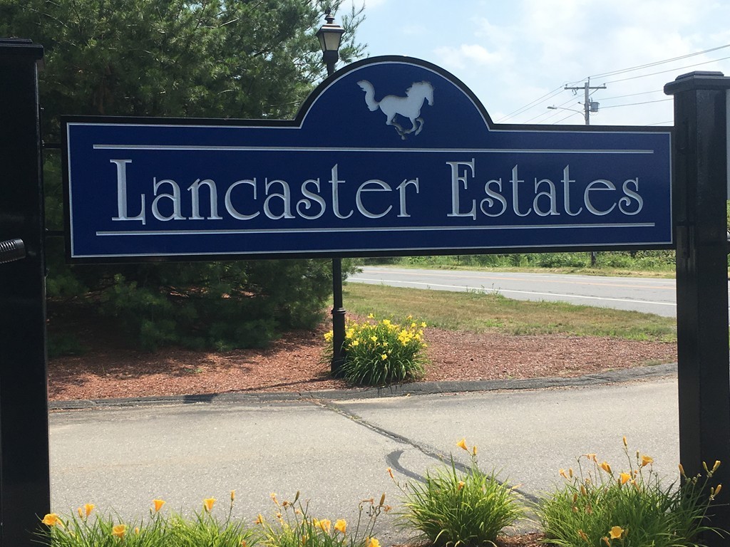 125 Shire Road, Unit 40 Leominster, MA 01453 - Photo 2 of 29 a sign that is on the side of a building