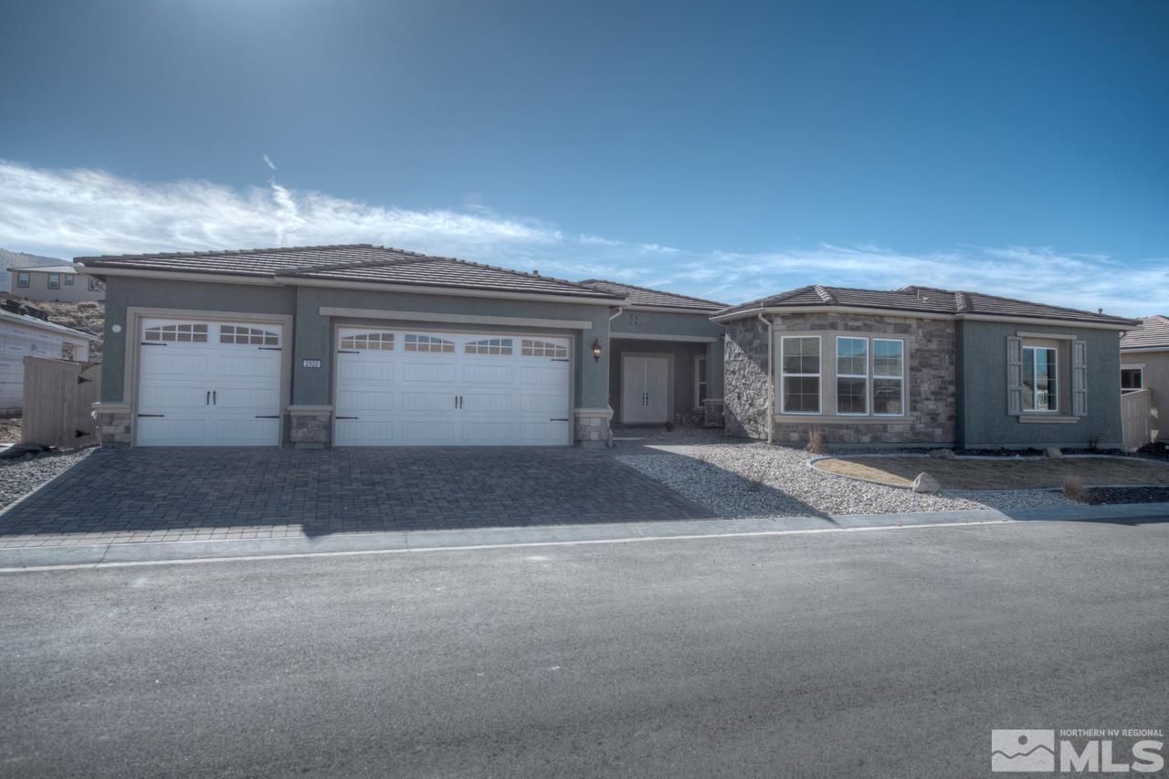 2920 Hasufel Way, Unit LOT #99 Reno, NV 89521 - Photo 1 of 1 a view of a white house with a outdoor space and parking space