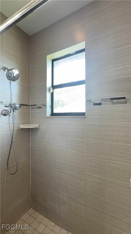 4310 4th Street Southwest Lehigh Acres, FL 33976 - Photo 14 of 27 a bathroom with a shower