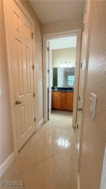 4310 4th Street Southwest Lehigh Acres, FL 33976 - Photo 23 of 27 a bathroom with a tub shower and sink