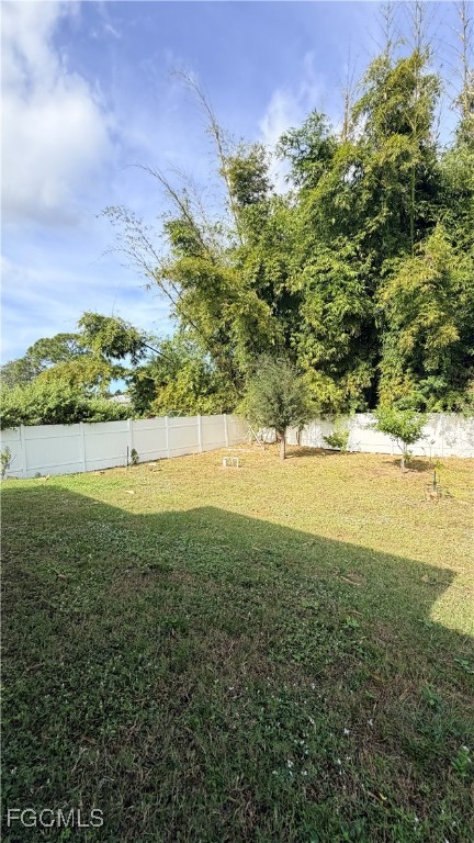 4310 4th Street Southwest Lehigh Acres, FL 33976 - Photo 26 of 27 a view of an outdoor space and mountain view