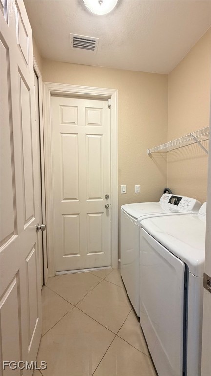 4310 4th Street Southwest Lehigh Acres, FL 33976 - Photo 9 of 27 a utility room with dryer and washer