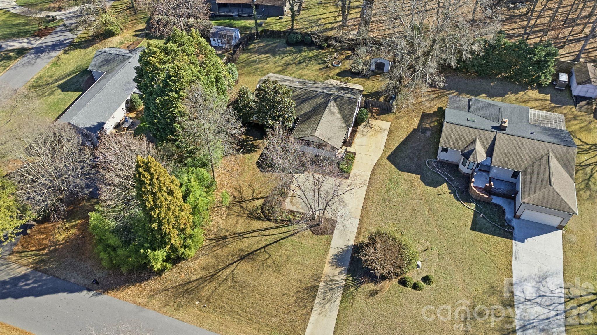 21326 Sandy Cove Road Cornelius, NC 28031 - Photo 20 of 21 an aerial view of a house with a yard