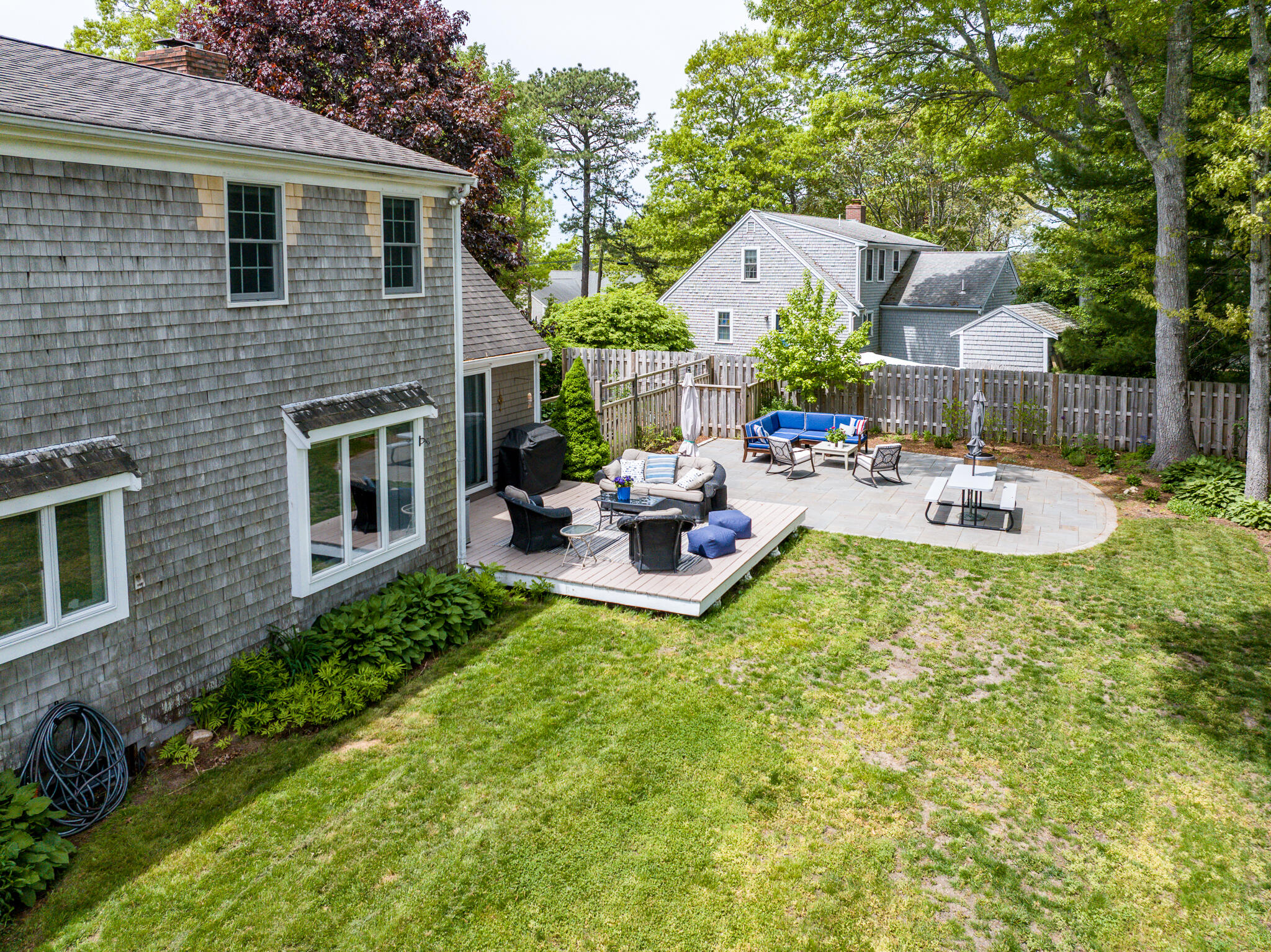 61 Angus Way Centerville, MA 02632 - Photo 53 of 59 a view of a house with backyard and patio