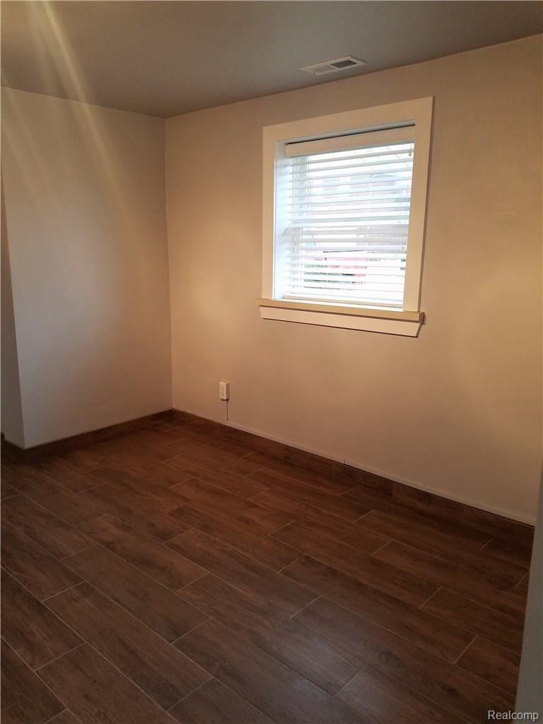 95 West Square Lake Road Troy, MI 48098 - Photo 8 of 19 Nook - with "wood look" tile flooring - windows in every room lets in all the sunlight. . .