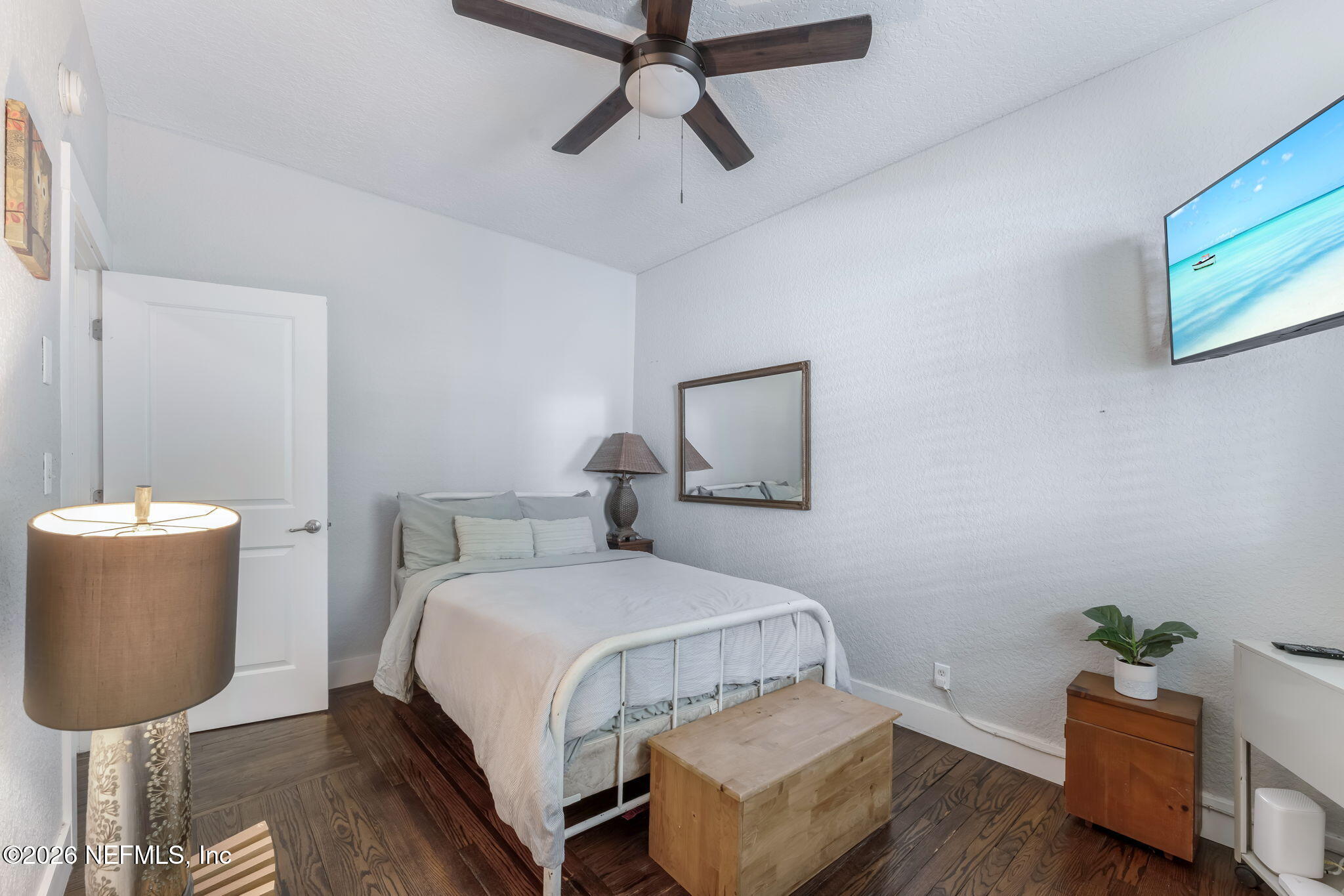 909 Cedar Street Jacksonville, FL 32207 - Photo 12 of 41 a bedroom with a bed and furniture